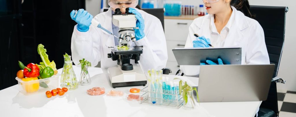 food-scientists-in-lab-coats-testing-samples-and-2026-01-08-08-08-08-utc